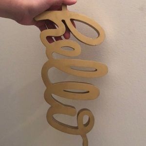 a cute bundle that has a sign plant and sunglasses